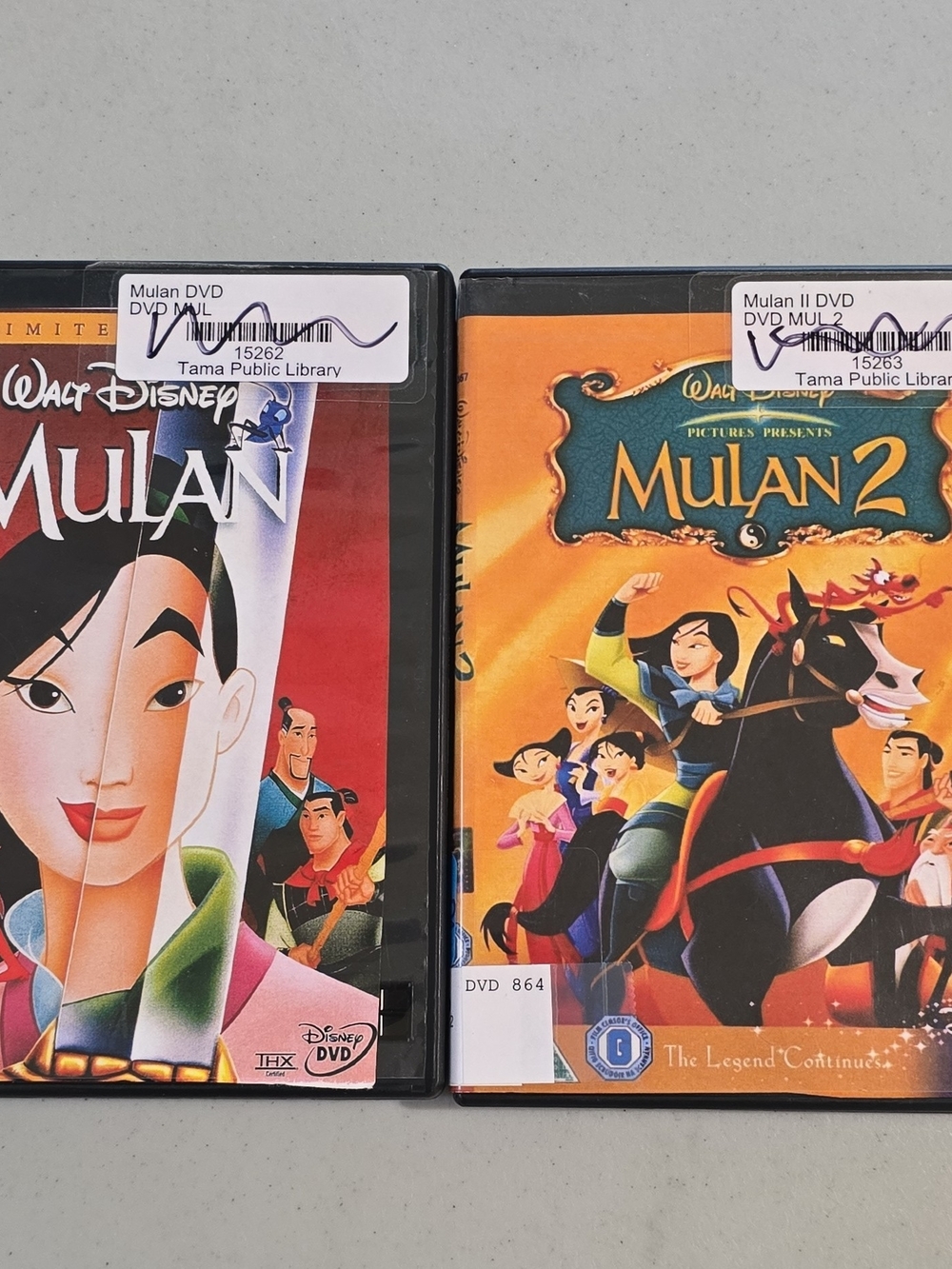 Disney Mulan & Mulan II DVD Pair - Red, Orange, Black